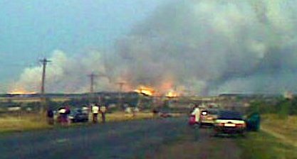 Пожар на складе боеприпасов в Лозовой. По этой дороге я проехал несколько часов назад... Фото с сайта г. Лозовая
